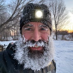 Elliot Nelson outside in the winter on a run